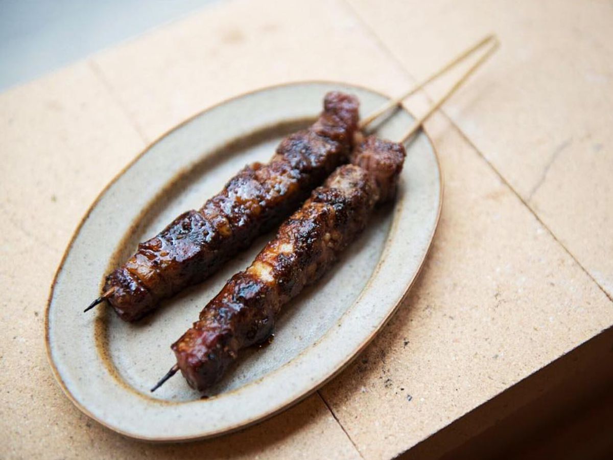 Aged lamb skewers at Britain’s best restaurant, Kiln in Soho, also one of central London’s best snacks
