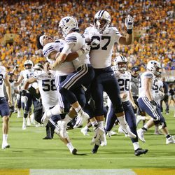 BYU players celebrate their win over Tennessee in Knoxville on Saturday, Sept. 7, 2019. BYU won 29-26 in double overtime.