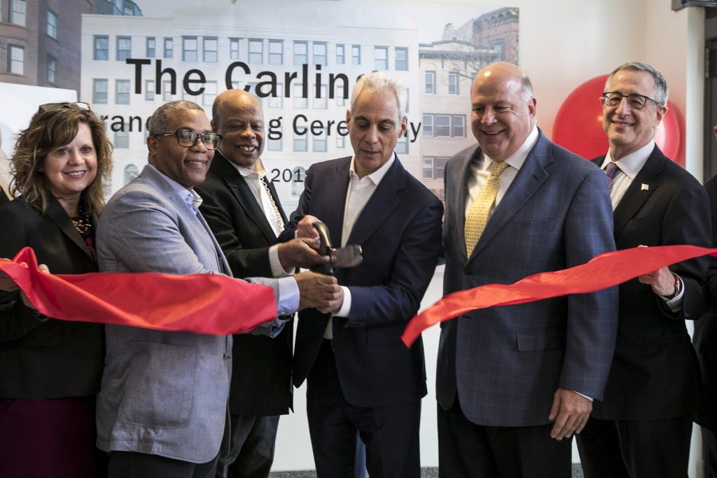 Mayor Rahm Emanuel (center), Ald. Walter Burnett Jr. (27th) (second from left) and housing advocates open the renovated and restored Carling Hotel at 1512 N. LaSalle St., with 80 units of single-room occupancy on the Near North Side, Monday afternoon, Apr