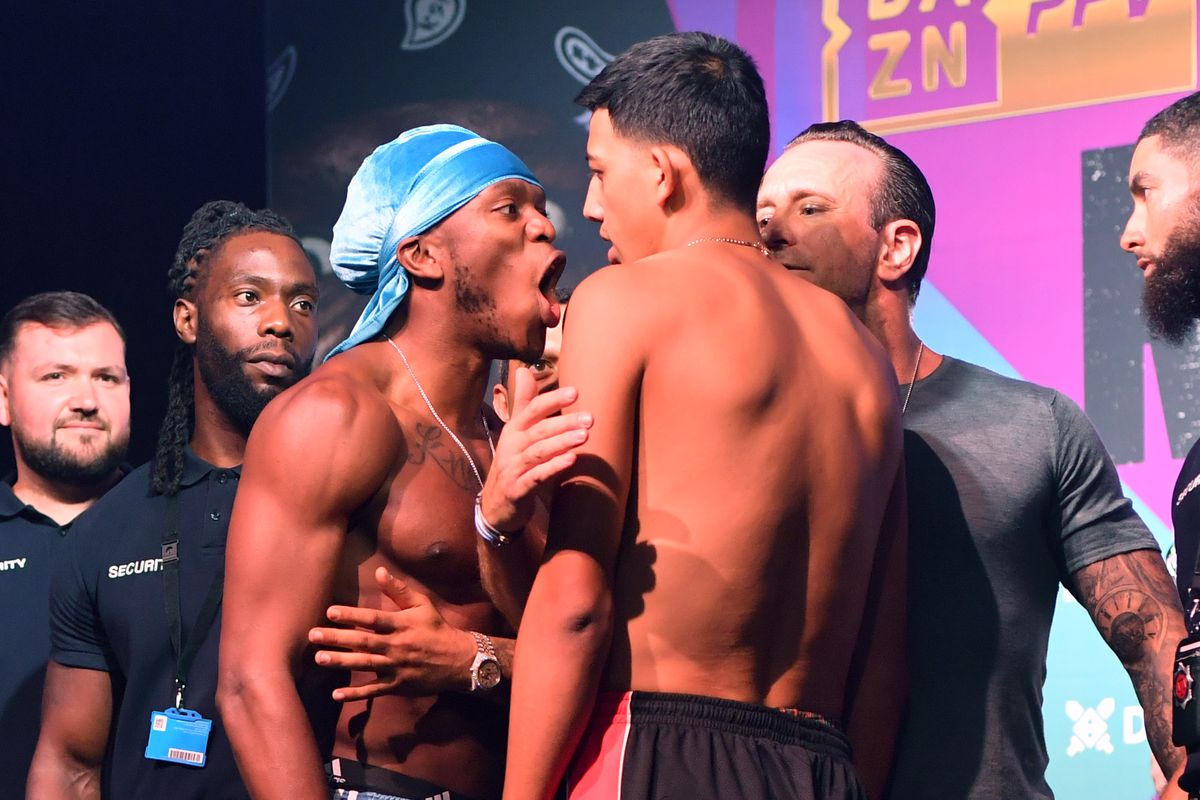 KSI goes head to head with Luis Alcaraz Pineda during the weigh-in ahead of his boxing match, on August 26, 2022 in London, England.