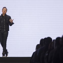 Ryan Smith, co-founder and CEO of Qualtrics, speaks to the crowd during Qualtrics' X4 Summit at the Salt Palace Convention Center in Salt Lake City on Wednesday, March 7, 2018.