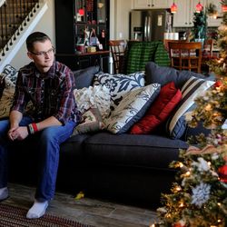 Freeman Stevenson poses for a photo at his father's home in Saratoga Springs on Friday, Dec. 2, 2016. Stevenson, 23, recently returned after 10 months fighting with the YPG, or People's Protection Unit, a Kurdish militia in Syria.