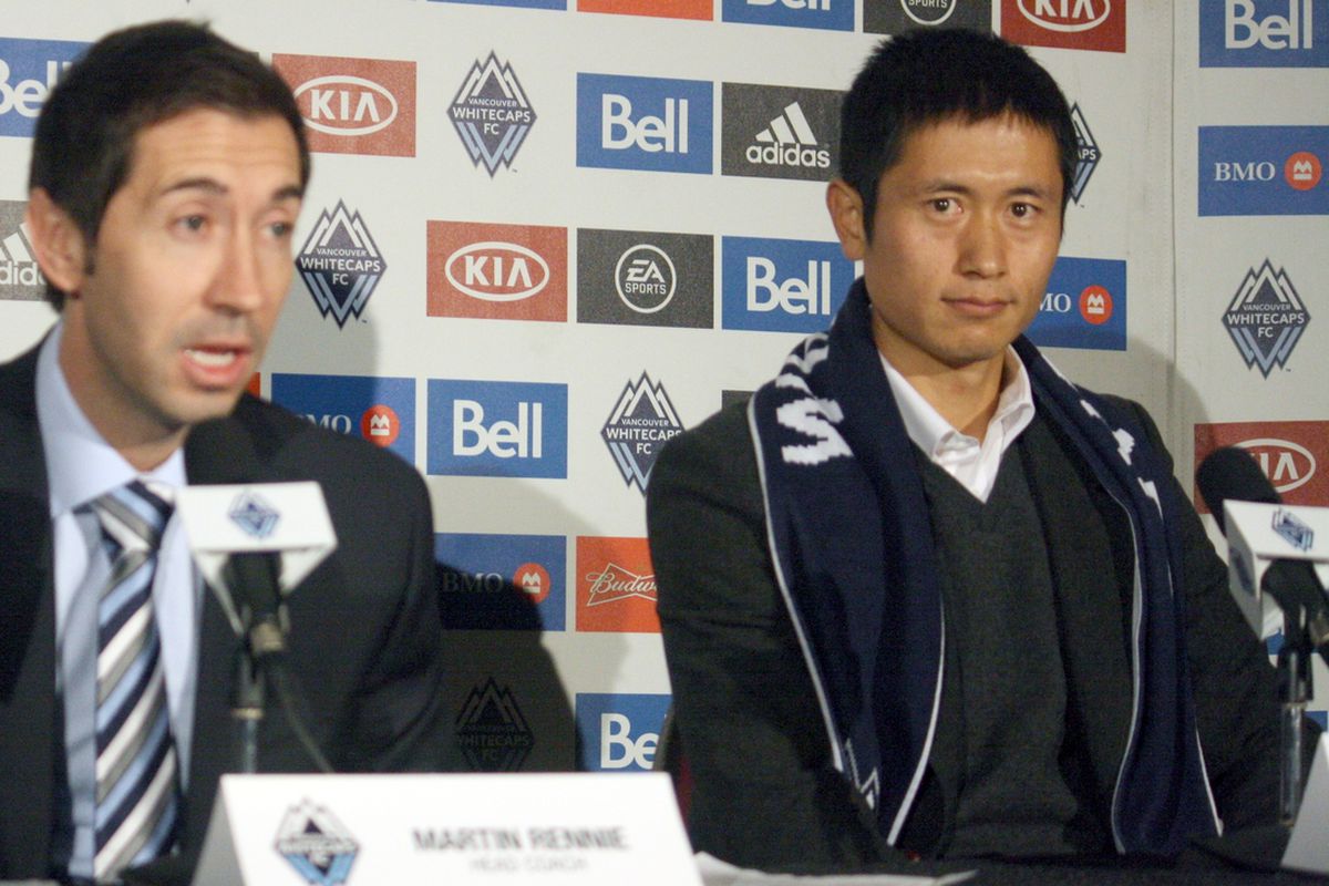 New Vancouver Whitecaps fullback Young-pyo Lee looks on as head coach Martin Rennie speaks during Lee's introductory press conference. (Benjamin Massey/Eighty Six Forever)