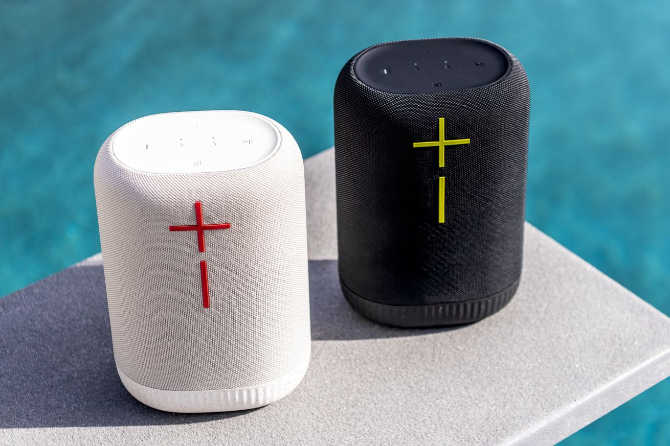 A marketing image of two UE Epicboom speakers on a diving board.