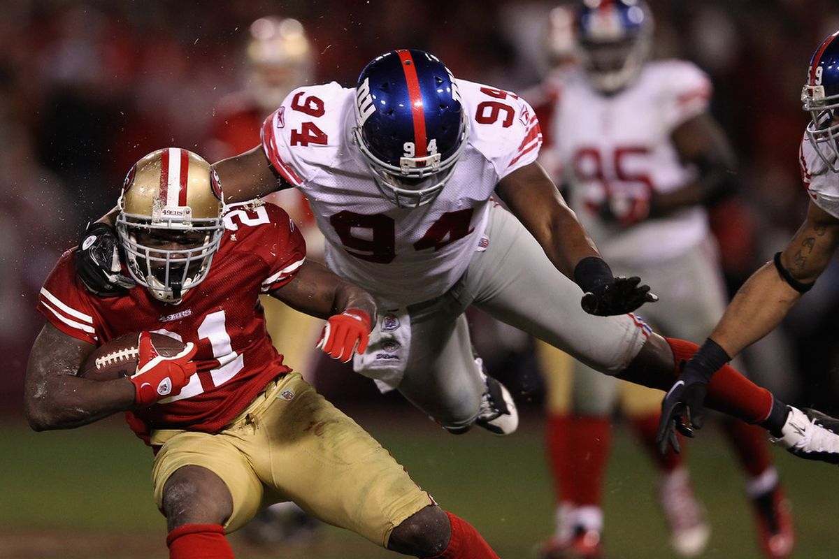 Mathias Kiwanuka flies through the air to make a tackle during last season's NFC Championship Game.  Kiwanuka is now part of a deep, diverse group of linebackers for the New York Giants. (Photo by Ezra Shaw/Getty Images)