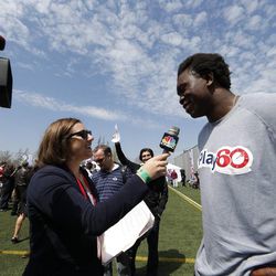 BYU's Ziggy Ansah speaks with the media after the NFL "Play 60" event for kids prior to the 2013 NFL draft.