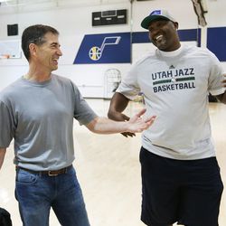 John Stockton laughs with Bryon Russell as the 1997 Utah Jazz team members gather for a reunion in Salt Lake City on Wednesday, March 22, 2017.