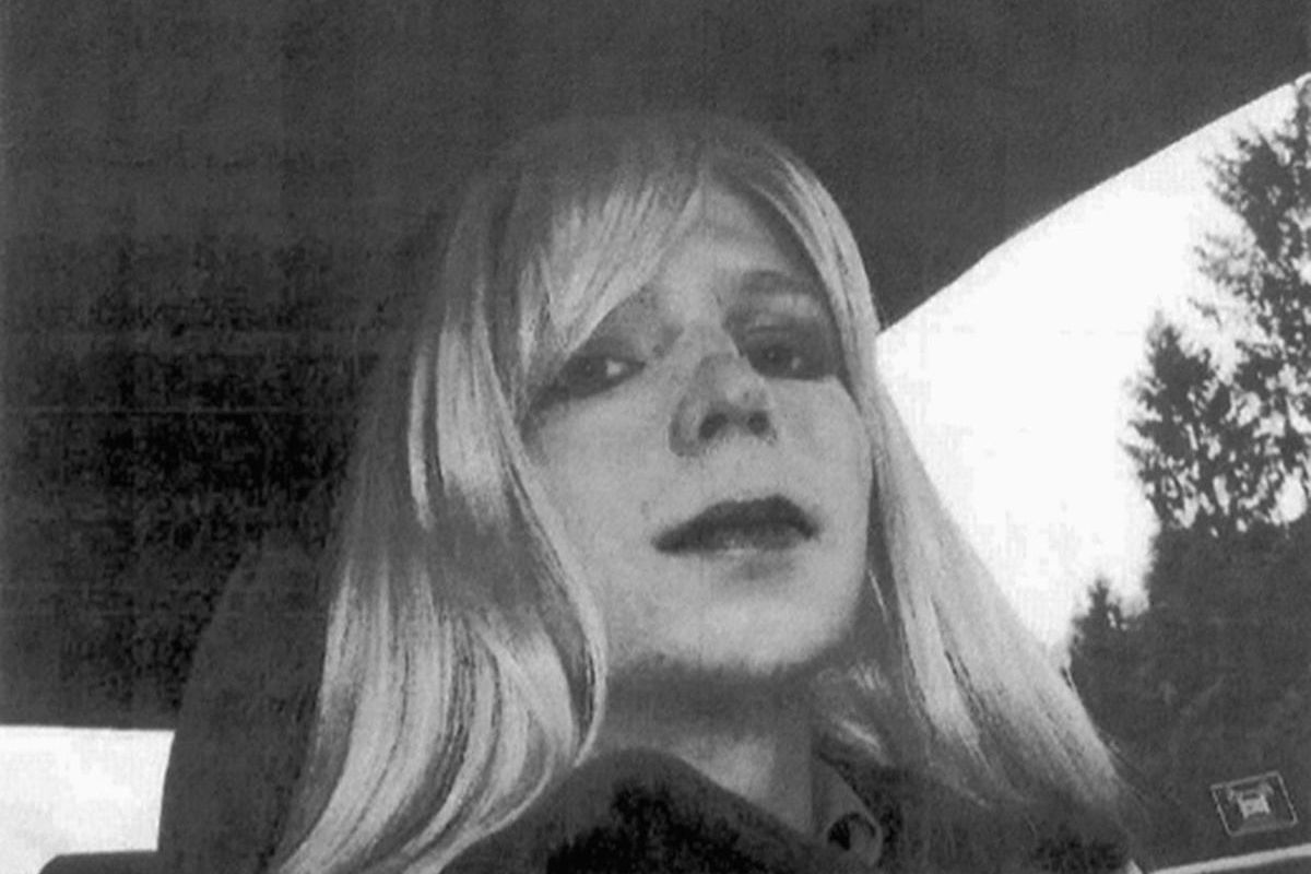 FILE - In this undated file photo provided by the U.S. Army, Pfc. Chelsea Manning poses for a photo wearing a wig and lipstick. Manning, a transgender soldier now serving 35 years at the Fort Leavenworth, Kansas military prison for leaking classified info