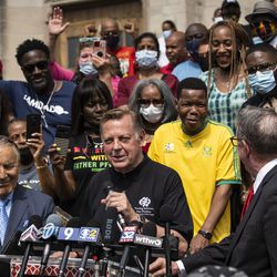 Flanked by attorneys and supporters, Father Michael Pfleger speaks during a news conference outside St. Sabina Church after the Archdiocese of Chicago announced that Pfleger will return to his role at senior pastor at the Auburn Gresham church, Monday afternoon, May 24, 2021. The archdiocese cleared him to return after an internal probe into decades-old allegations of sexual abuse against minors.