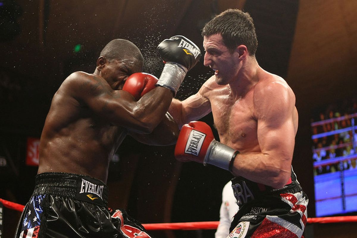 Carl Froch and Jermain Taylor put on a war last night, with Froch pulling out an epic 12th round TKO victory while behind on the cards. The two are already talking about doing it again. (Photo by Nick Laham/Getty Images)