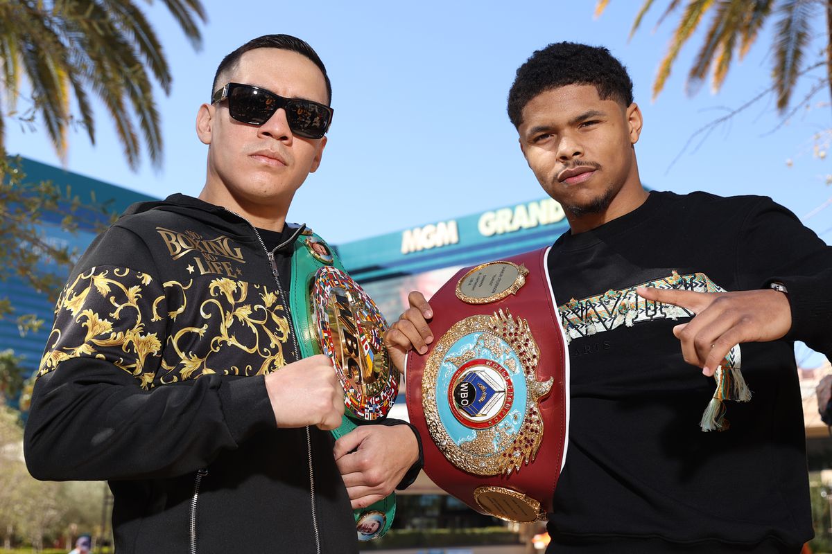 Oscar Valdez (L) and Shakur Stevenson (R) pose ahead of their WBC and WBO super featherweight championship at The MGM Grand Garden Arena on March 09, 2022 in Las Vegas, Nevada.