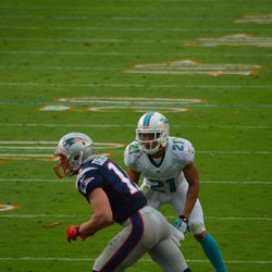 Dec. 15, 2013 Miami Gardens, FL - Miami Dolphins cornerback Brent Grimes (21) watches New England Patriots wide receiver Julian Edelman (11) go in motion prior to a fourth quarter play. 