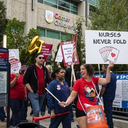 More than 2,000 nurses at the University of Chicago Medical Center, represented by National Nurses United, strike outside the South Side hospital, Friday morning, Sept. 20, 2019.