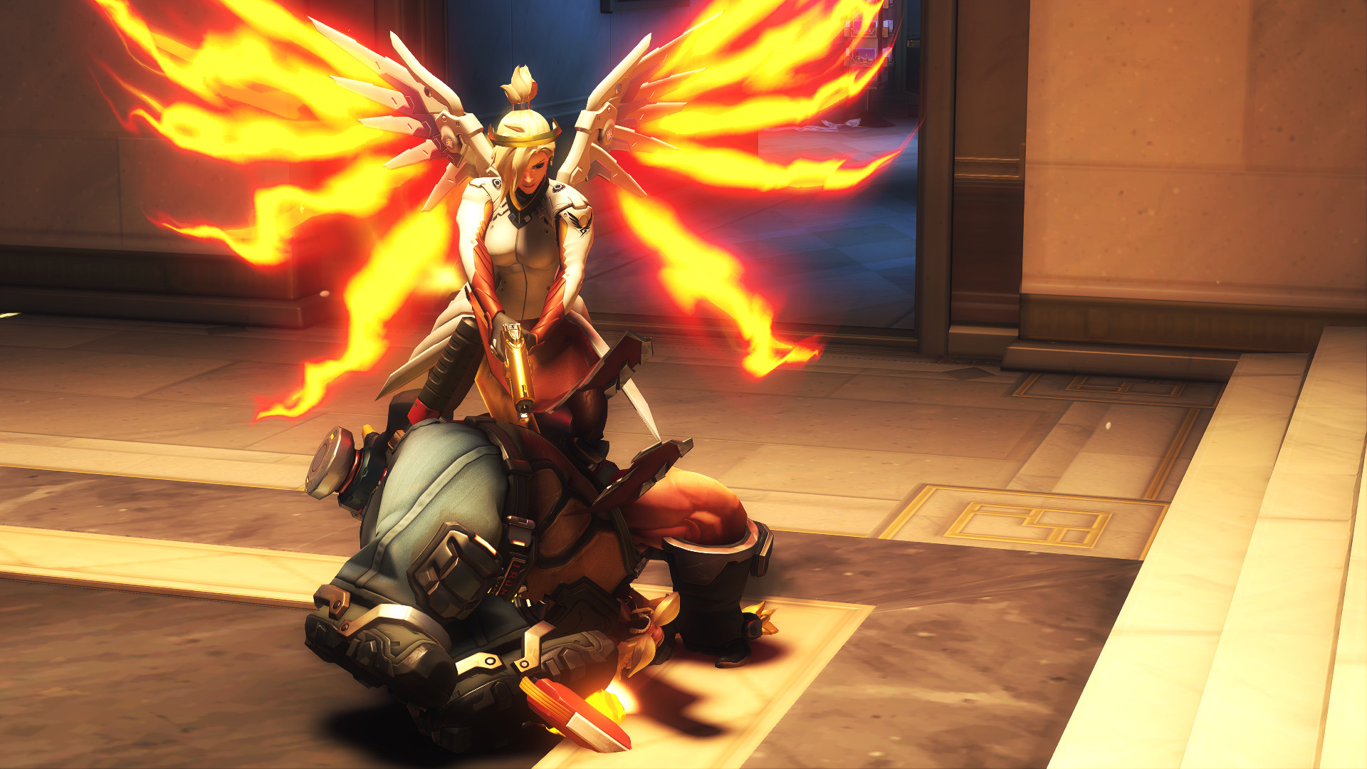 Mercy (from Overwatch) aims her pistol at the collapsed Torbjorn by her feet