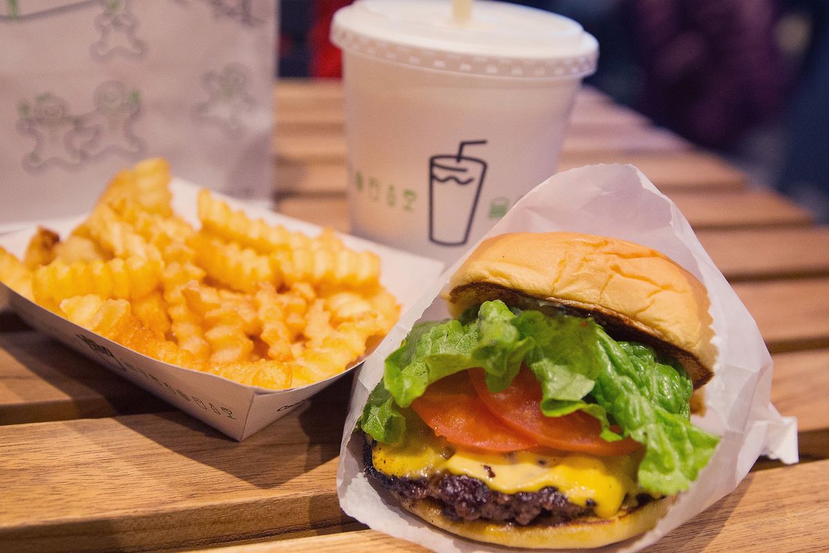 A burger, fries, and drink at shake shack