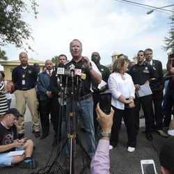 Orlando Mayor Buddy Dyer addresses reporters while flanked by members of law enforcement and community leaders during a news conference after a shooting involving multiple fatalities at a nightclub in Orlando, Fla., Sunday, June 12, 2016. 