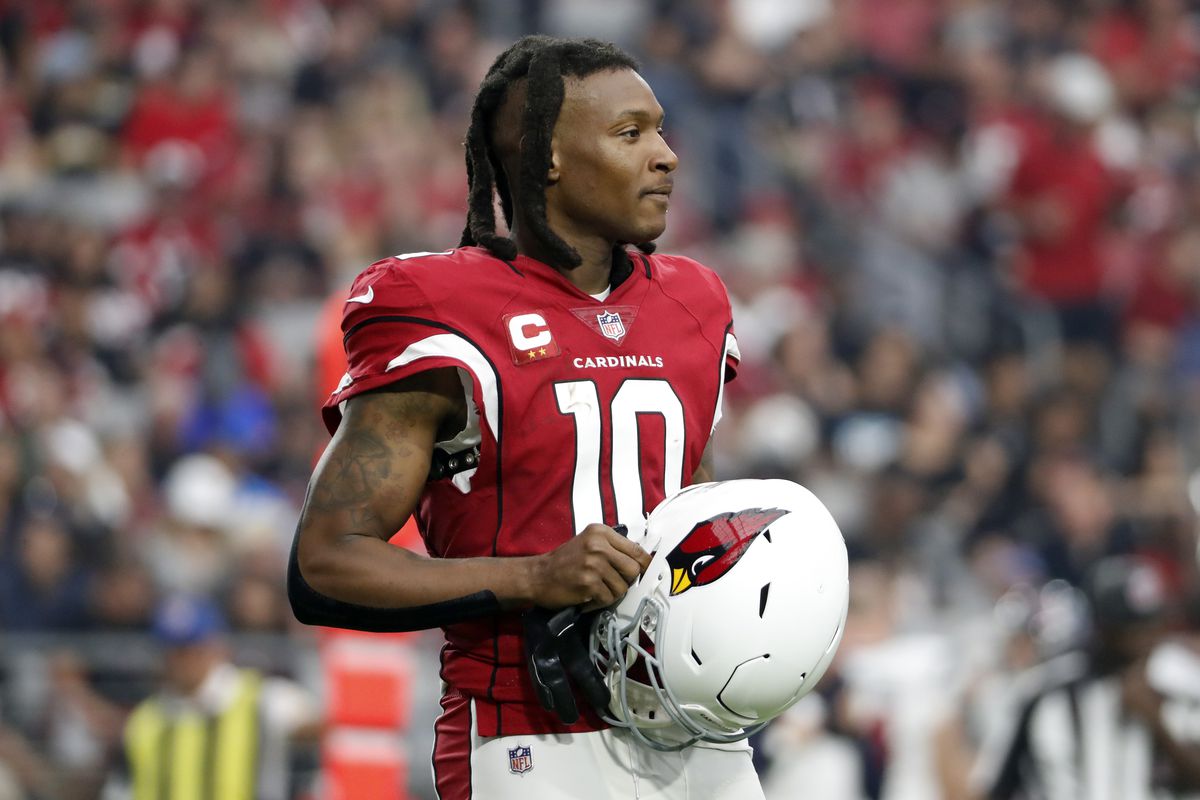 Wide receiver DeAndre Hopkins #10 of the Arizona Cardinals stands on the field between plays during the game against the Houston Texans at State Farm Stadium on October 24, 2021 in Glendale, Arizona. The Cardinals beat the Texans 31-5.