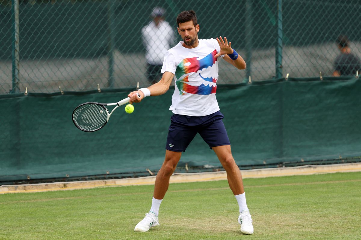 Novak Djokovic of Serbia plays a forehand during their training session ahead of The Championships Wimbledon 2022 at All England Lawn Tennis and Croquet Club on June 25, 2022 in London, England.