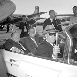 John F. Kennedy arrives in Salt Lake City in 1960 with Bill Thurman, U.S. District Attorney (and later U.S. Sen.) Ted Moss, right, and Cal Rollin, front.  