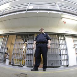 Warden Scott Crowther stands in front of cells in Wasatch A-East block during a media tour Thursday, Feb. 26, 2015, at the Utah State Prison in Draper. Gov. Gary Herbert said Thursday that he's opposed to the idea of allowing a state commission to pick a location to build a new prison instead of leaving the decision with the Legislature. 