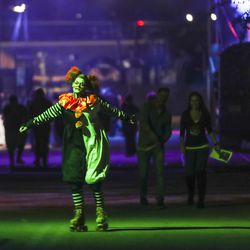 Taylor Morgan roller skates in her costume as she works at Fear Factory in Salt Lake City on Tuesday, Oct. 16, 2018.