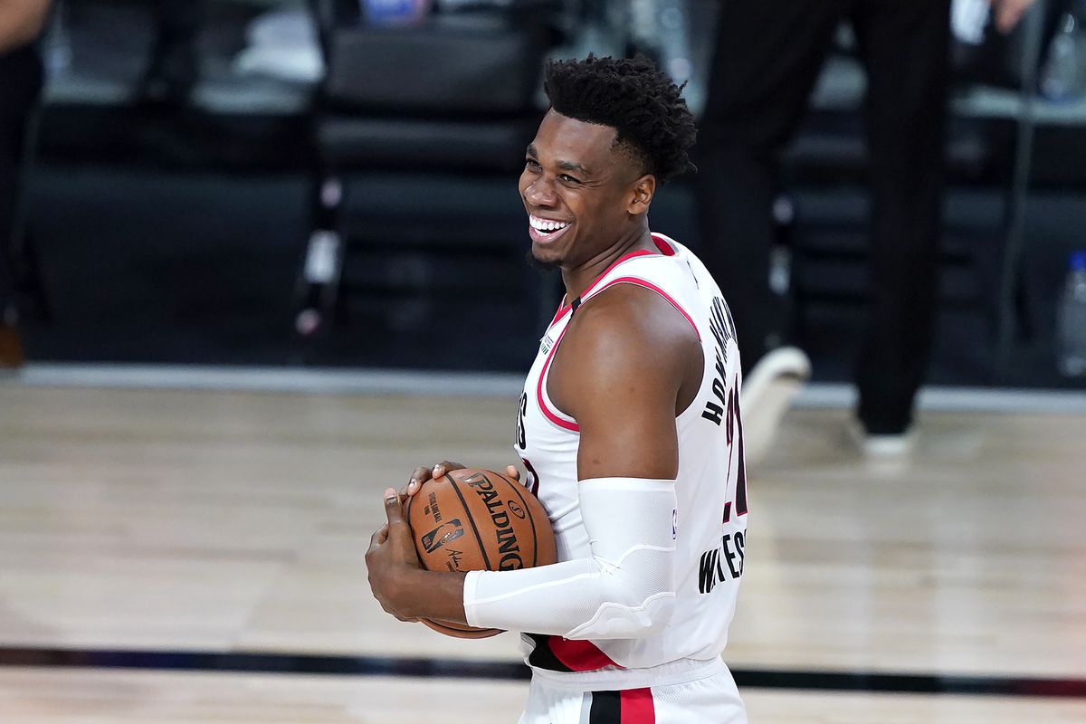Portland Trail Blazers’ Hassan Whiteside reacts after missing a wide-open dunk after being fouled by the Brooklyn Nets during the first half of an NBA basketball game at ESPN Wide World of Sports Complex.