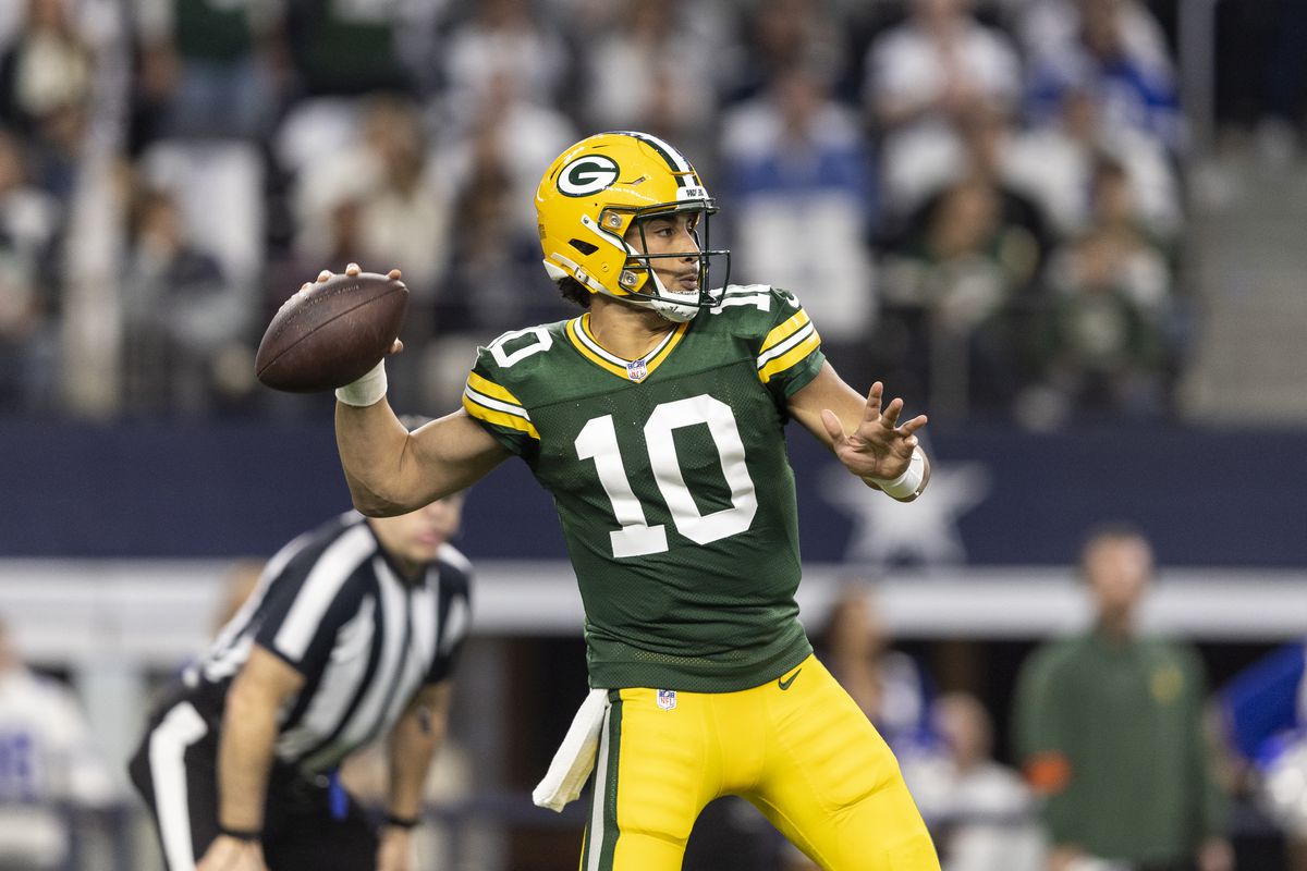 Jordan Love #10 of the Green Bay Packers looks to pass during an NFL wild-card playoff football game between the Dallas Cowboys and the Green Bay Packers at AT&amp;T Stadium on January 14, 2024 in Arlington, Texas.