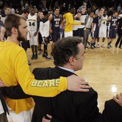 Brigham Young Cougars and Baylor Bears pray after their NIT Final Four in New York City Tuesday, April 2, 2013. BYU lost 76-70.
