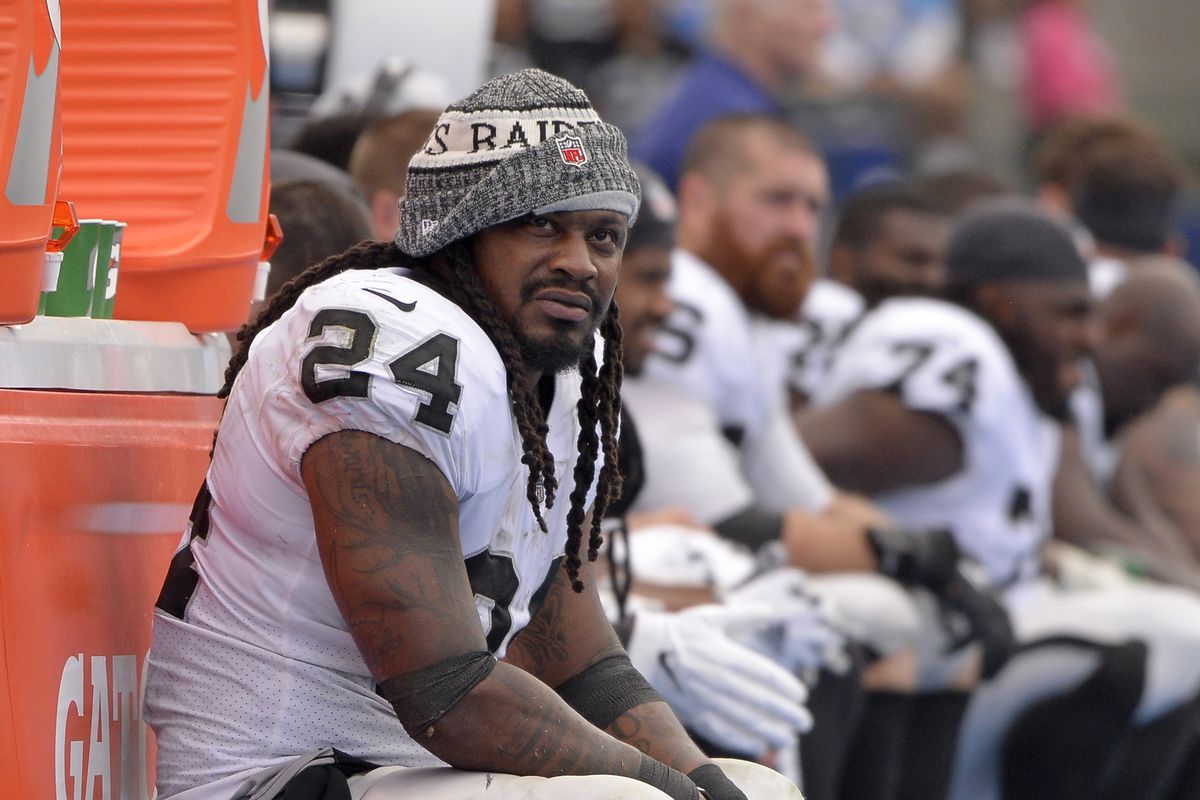 Oakland Raiders running back Marshawn Lynch looks on during the third quarter against the Los Angeles Chargers at StubHub Center.