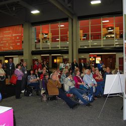 Patrons participate in a class at the FamilySearch exhibit in the expo hall of the Salt Palace Convention Center during the fifth annual RootsTech Conference last week in Salt Lake City.