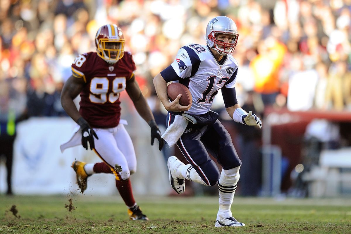Running Back Tom Brady in the wildcat formation. (Photo by Patrick McDermott/Getty Images)