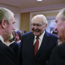 Elder L. Tom Perry chats with attendees at the Little America Hotel for the Utah Catholic Community Services Awards event on Thursday, Nov. 6, 2014, in Salt Lake City. 
