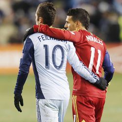 Sporting's Benny Feilhaber and Real's Javier Morales walk off the pitch at the end of regulation as Real Salt Lake and Sporting KC play Saturday, Dec. 7, 2013 in MLS Cup action. Sporting KC won in a shootout.