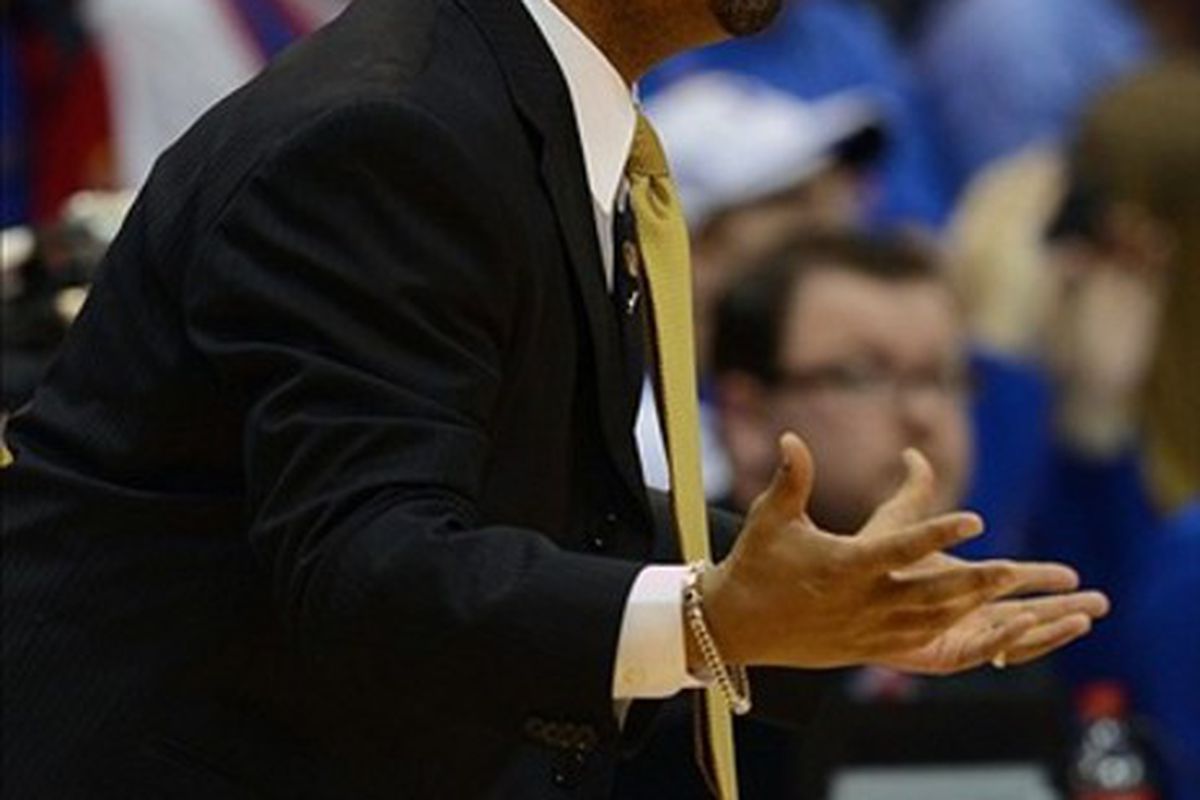 Feb 25, 2012; Lawrence, KS, USA; Missouri Tigers head coach Frank Haith talks to his players against the Kansas Jayhawks in the first half at Allen Fieldhouse. Kansas won the game in overtime 87-86. Mandatory Credit: John Rieger-US PRESSWIRE