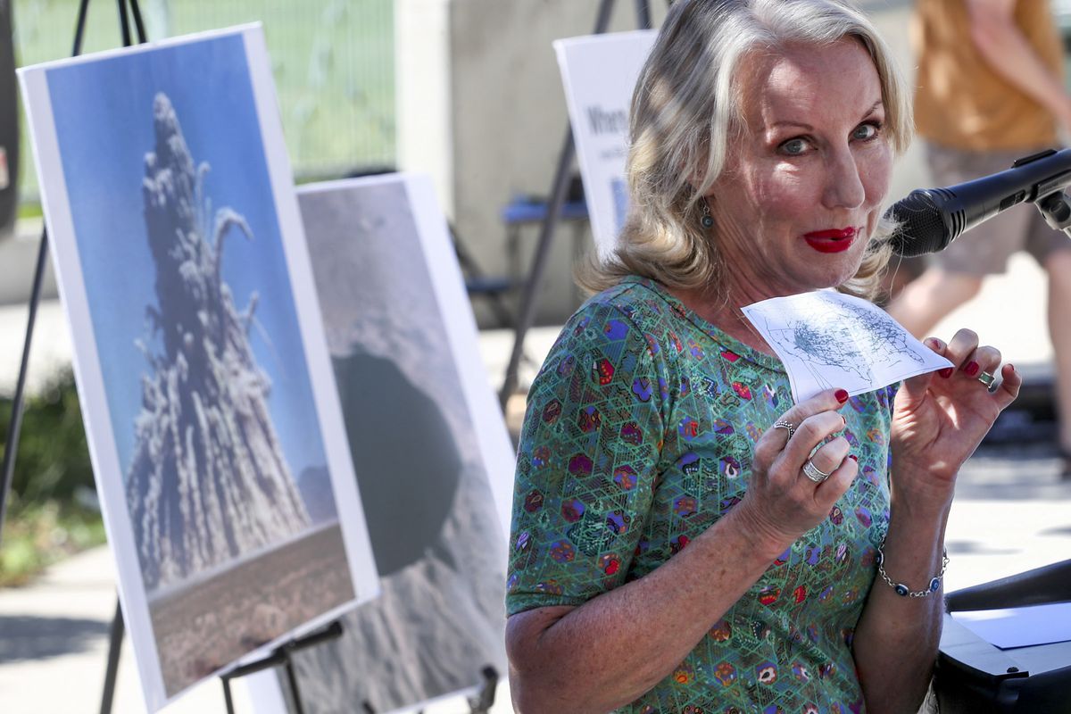 Mary Dickson holds up a map that she keeps with her that shows the path of nuclear fallout from at least three nuclear tests in Nevada.