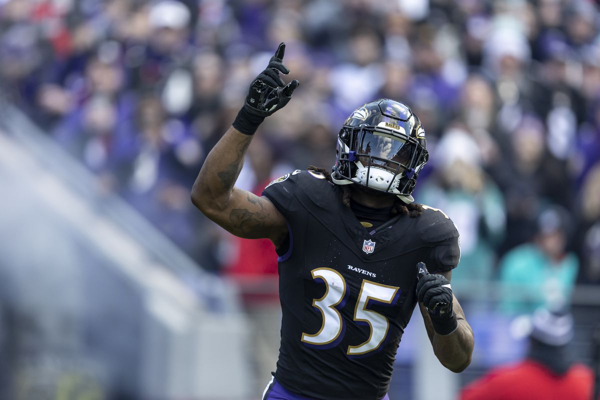 Gus Edwards #35 of the Baltimore Ravens reacts as he takes the field prior to an NFL football game between the Baltimore Ravens and the Miami Dolphins at M&amp;T Bank Stadium on December 31, 2023 in Baltimore, Maryland.