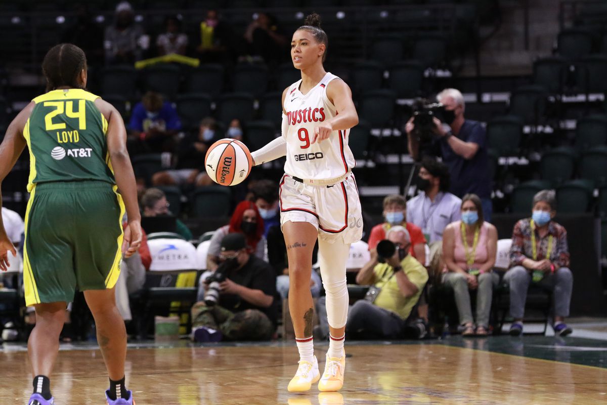 Natasha Cloud #9 of the Washington Mystics handles the ball against the Seattle Storm on September 7, 2021 at the Angel of the Winds Arena, in Everett, Washington.