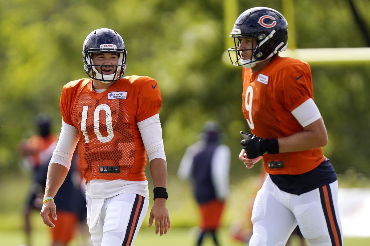 Mitchell Trubisky of the Chicago Bears talks with Nick Foles during training camp at Halas Hall on August 18, 2020 in Lake Forest, Illinois.