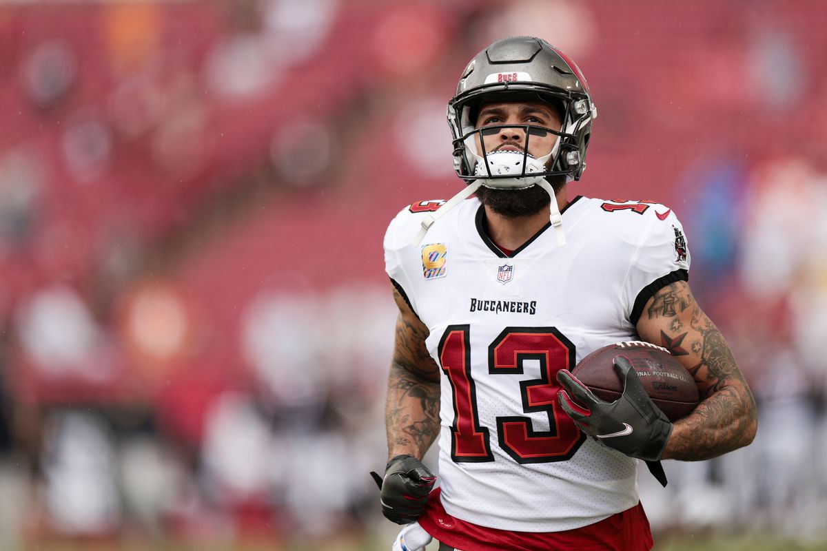 Mike Evans #13 of the Tampa Bay Buccaneers warms up prior to the game against the Chicago Bears at Raymond James Stadium on October 24, 2021 in Tampa, Florida.