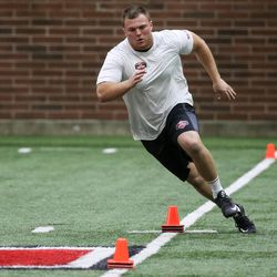 Defensive end Hunter Dimick runs a drill at the University of Utah football Pro Day in Salt Lake City on Thursday, March 23, 2017.