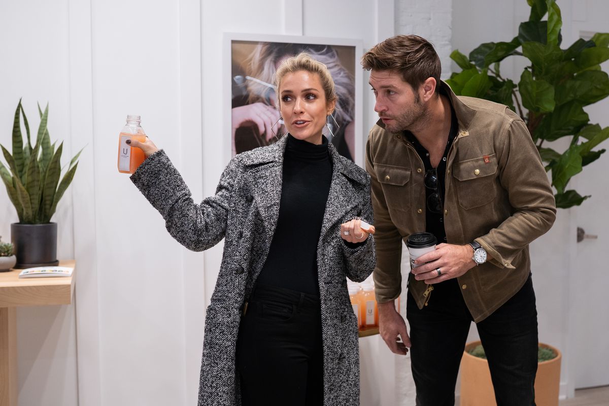 Kristin Cavallari, founder of Uncommon James, and her husband Jay Cutler, talk during the opening of her store’s West Loop location in October 2019.