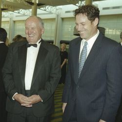 Former BYU head football coach LaVell Edwards laughs with Steve Young during a tribute April 11, 2001.