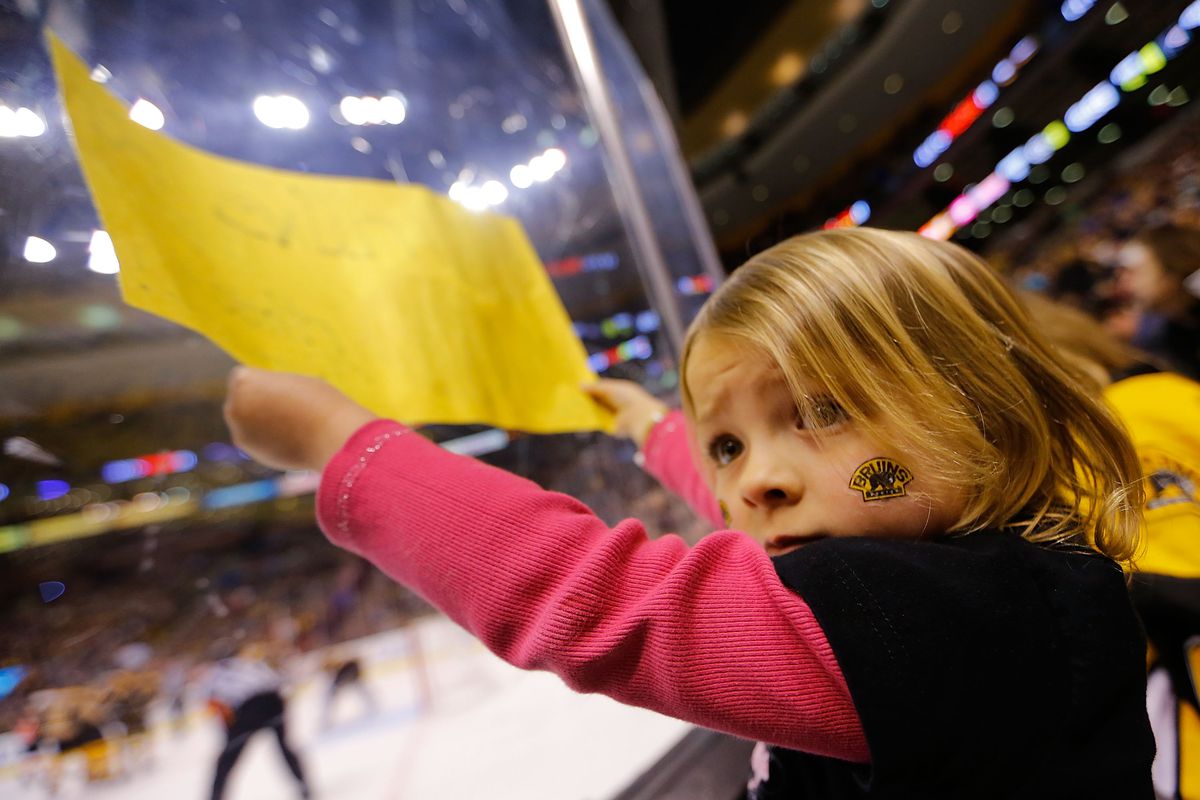 A little Bruins fan cheers her team