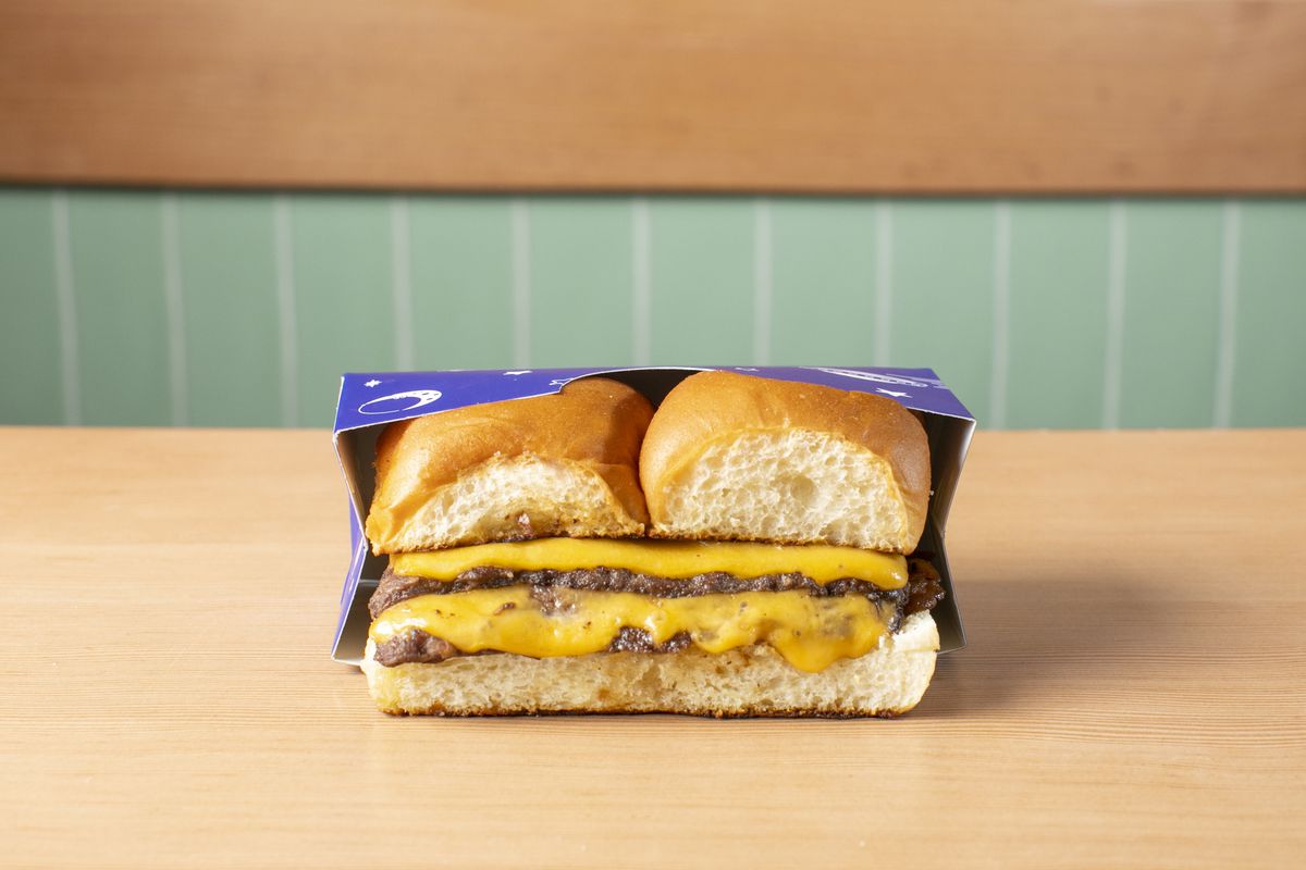 A double slider in blue packaging on a counter