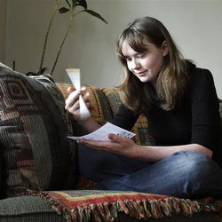 Rebecca Nickerson, a tenth grader at West High School achieved a perfect on her ACT. She twirls her pencil as she does a crossword puzzle in her home in Salt Lake City, Tuesday, April 12, 2011.