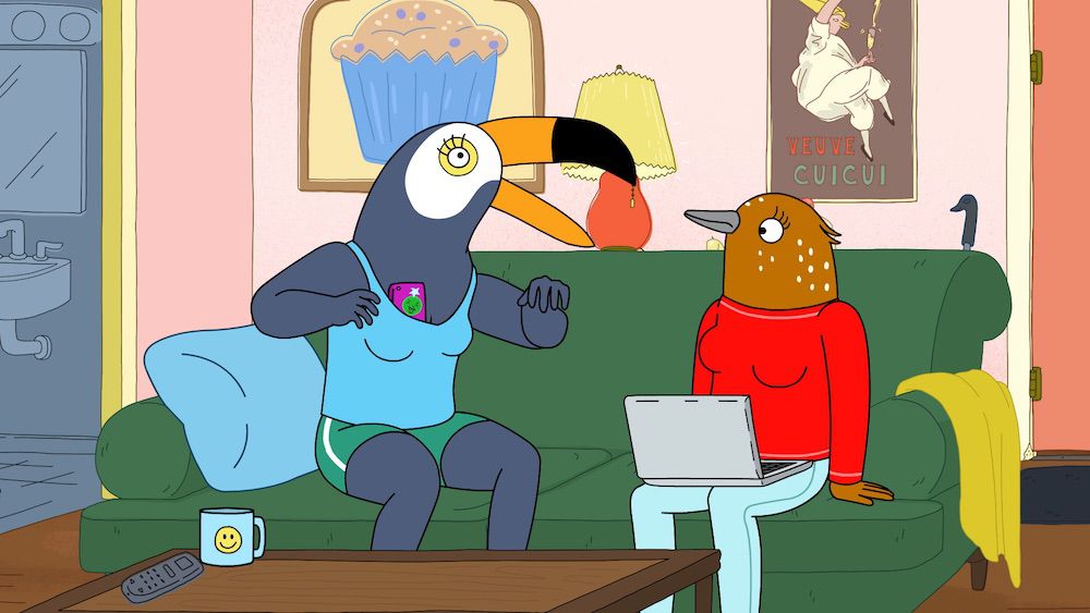 Tuca and Bertie sitting on a couch