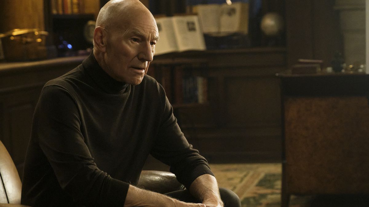 Jean-Luc Picard sitting in his chair looking dismayed
