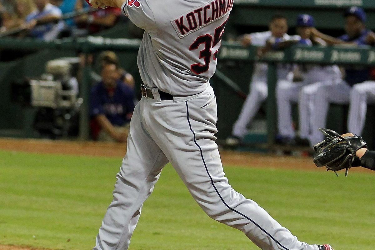 Sep 12, 2012; Arlington, TX; Casey Kotchman shows off his new-style batting helmet by hitting into a fielders choice. 