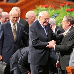 Elder L. Tom Perry , left, and Elder Jeffrey R. Holland at the end of the final session of the 185th Annual General Conference for The Church of Jesus Christ of Latter-day Saints Sunday, April 5, 2015, in Salt Lake City.  
