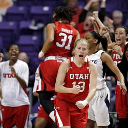Utah players celebrate after a basket during overtime of a women's NIT college basketball semifinal against the Kansas State on Wednesday, April 3, 2013, in Manhattan, Kan. Utah won 54-46. (AP Photo/Charlie Riedel)day, April 3, 2013, in Manhattan, Kan. Utah won 54-46. (AP Photo/Charlie Riedel)  